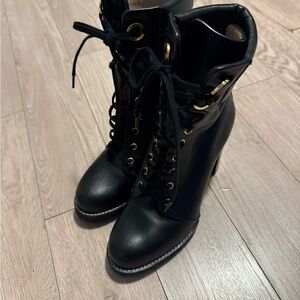 Stuart Weitzman Black Lace-Up Boots with Gold Accents